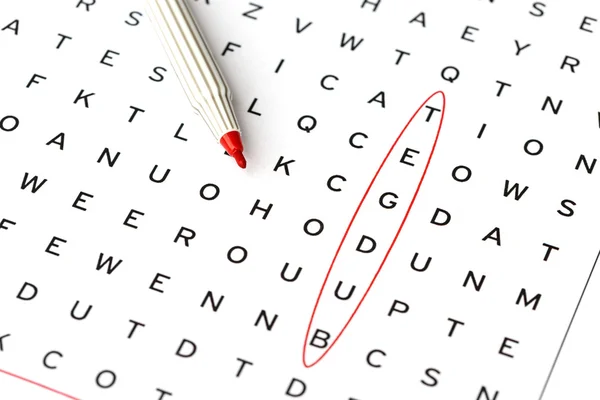 Budget in solving crossword puzzle, close up — Stock Photo, Image