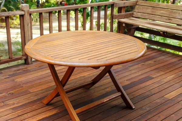 Teak wood table stand on the terrace — Stock Photo, Image