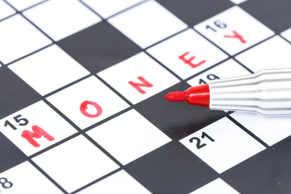 Close up red marker on Crossword - Money — Stock Photo, Image