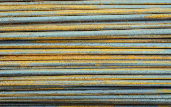 Barre rotonde di acciaio da vicino utilizzate per rinforzare il calcestruzzo , — Foto Stock