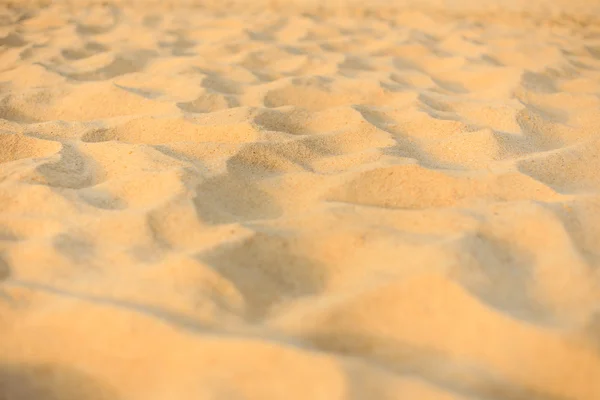 Textura de arena y huellas en la arena — Foto de Stock