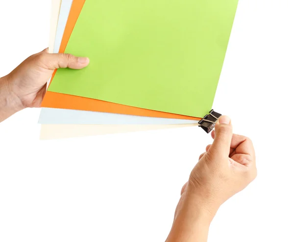 Hand met kleurrijke papier en paperclips — Stockfoto