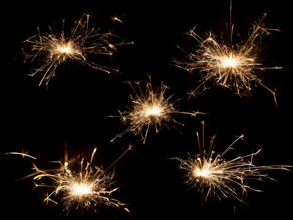 Christmas sparkler on black background — Stock Photo, Image