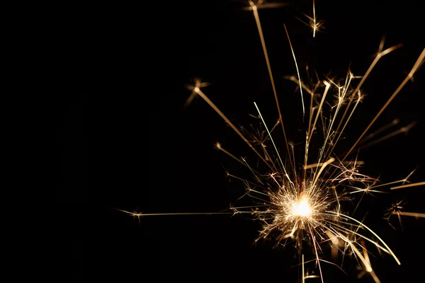 Christmas sparkler on black background — Stock Photo, Image