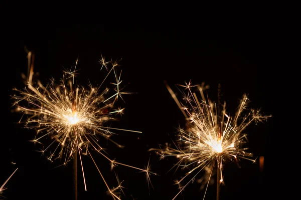 Navidad sparkler sobre fondo negro — Foto de Stock