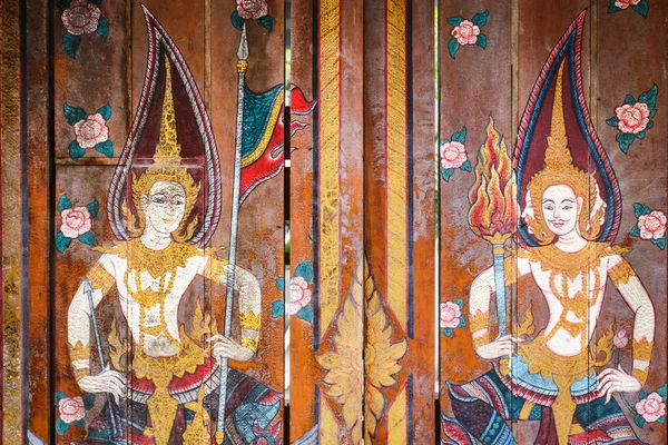 Zeichnung im thailändischen Stil an der alten Holztür — Stockfoto