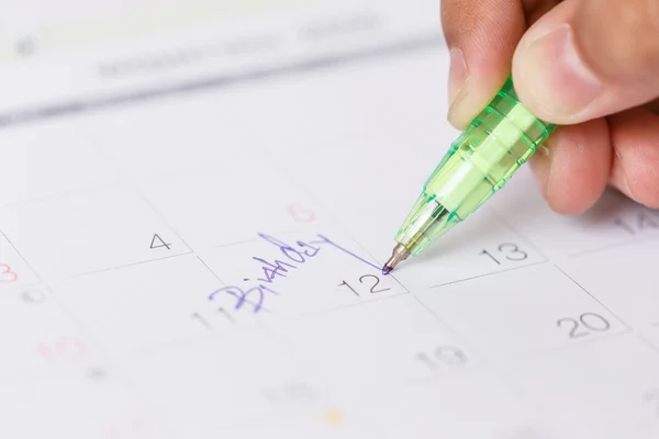 Pennan skriver om kalendern — Stockfoto