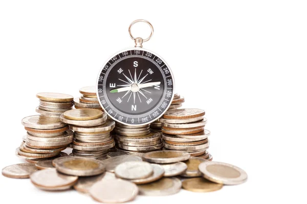 Compass on coin stack — Stock Photo, Image