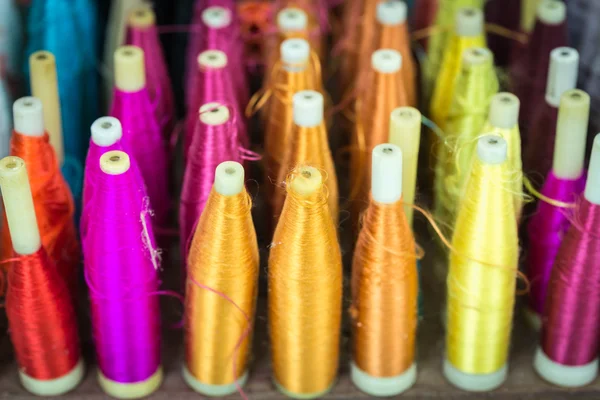 Colorful bobbins pile — Stock Photo, Image