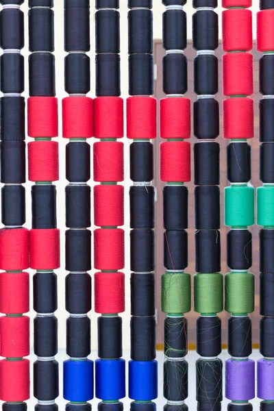 Colorful bobbins pile — Stock Photo, Image
