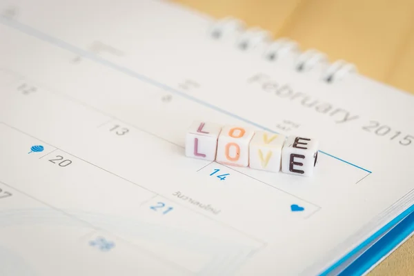 LOVE written with letter beads — Stock Photo, Image