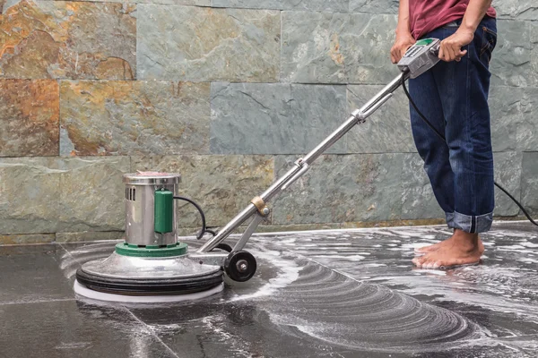 Man cleaning floor — Stock Photo, Image