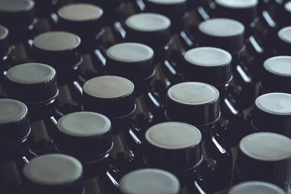 Black plastic bottles — Stock Photo, Image