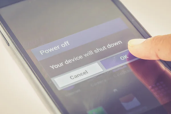 Finger press power off button — Stock Photo, Image
