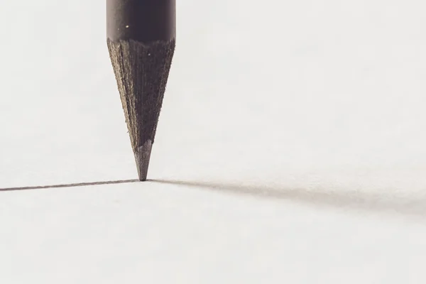 Black pencil with stroke — Stock Photo, Image