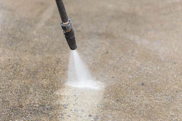 Floor cleaning with water jet — Stock Photo, Image