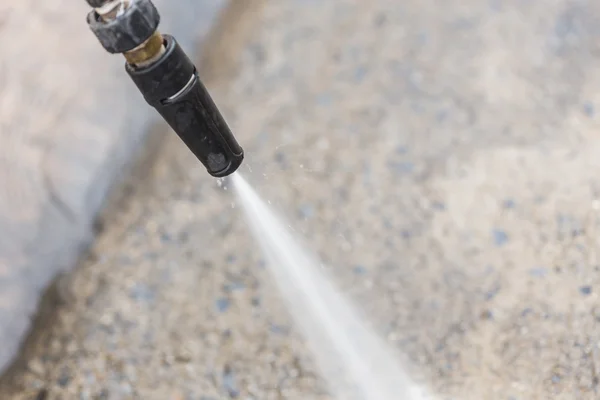 Floor cleaning with water jet — Stock Photo, Image