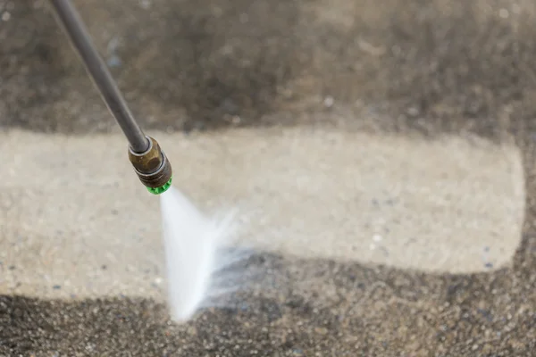 Floor cleaning with water jet — Stock Photo, Image