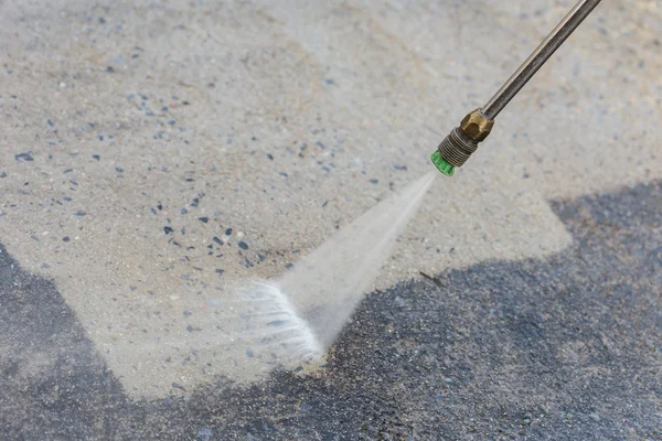 Floor cleaning with water jet — Stock Photo, Image