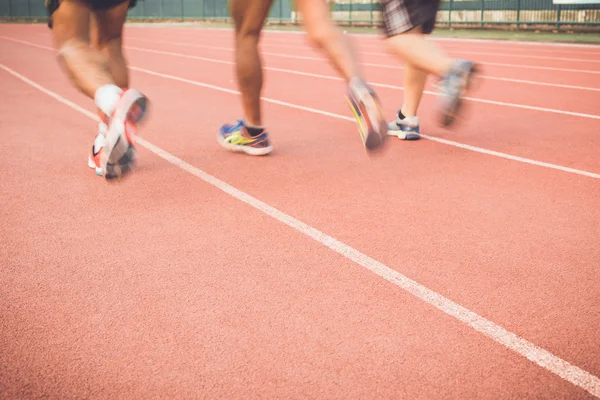 Runners feet on stadium