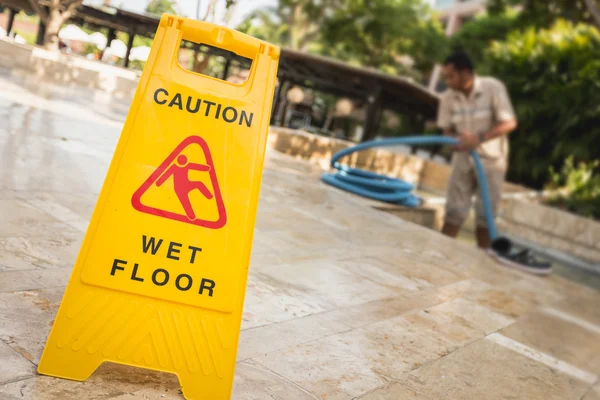 Caution sign on floor — Stock Photo, Image
