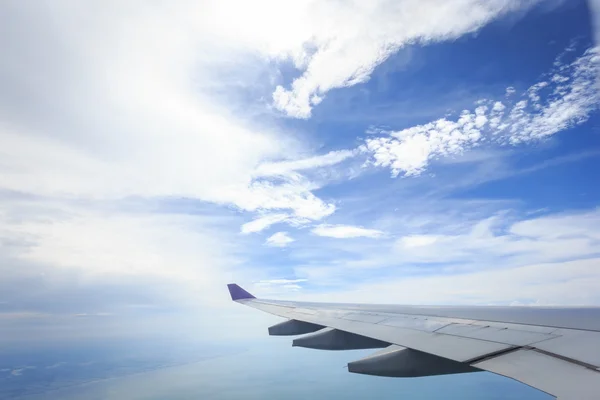 Cloud with wing of airplane — Stock Photo, Image