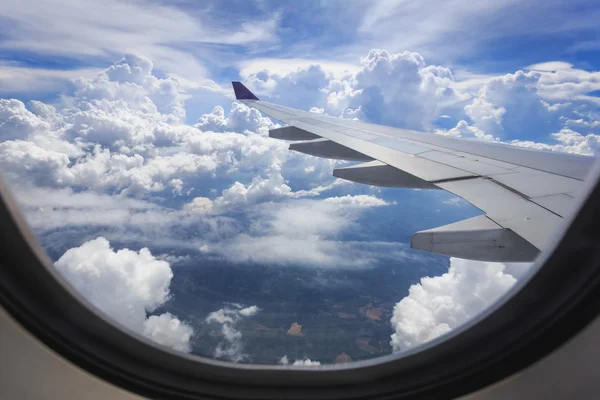 cloud and wing of airplane