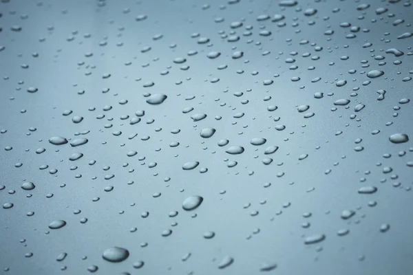 Vattendroppar på bilen — Stockfoto
