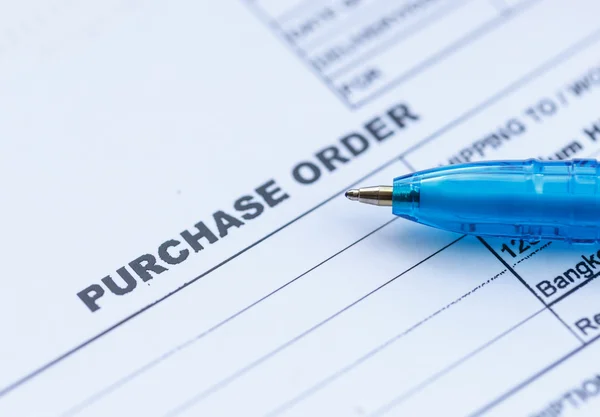 Purchase order with pen — Stock Photo, Image