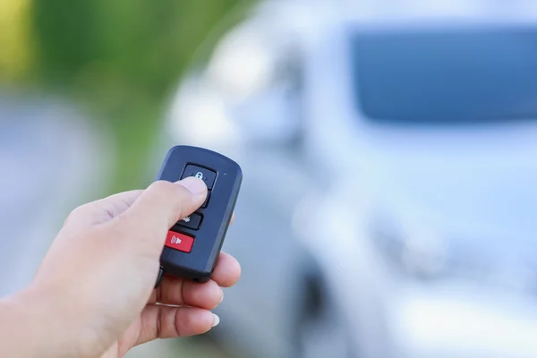 Woman holding key of car Stock Image