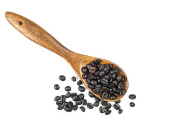 Tahta kaşıkta kahve çekirdekleri.