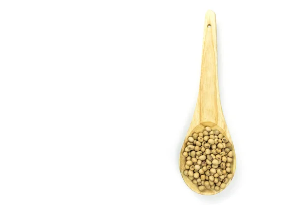 Semi di soia in cucchiaio di legno — Foto Stock