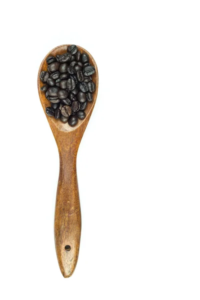 Kaffeebohnen im Holzlöffel — Stockfoto
