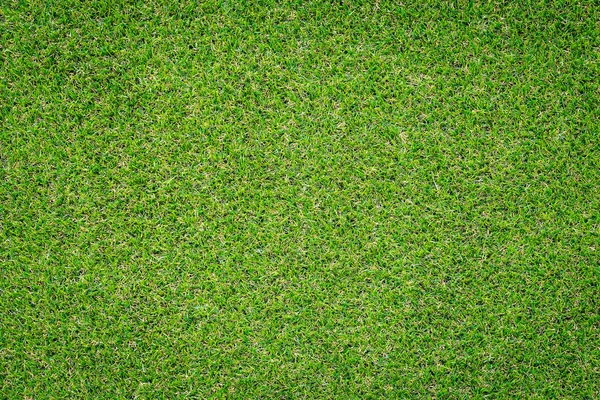 Зеленая искусственная трава — стоковое фото