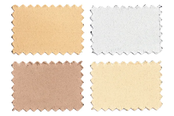 Набор образцов кусочки цветной ткани изолированы на белом — стоковое фото