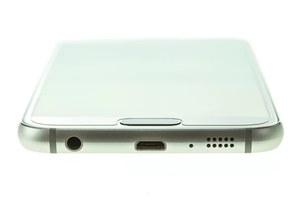 Macro bottom part of smartphone isolated on white — Stock Photo, Image