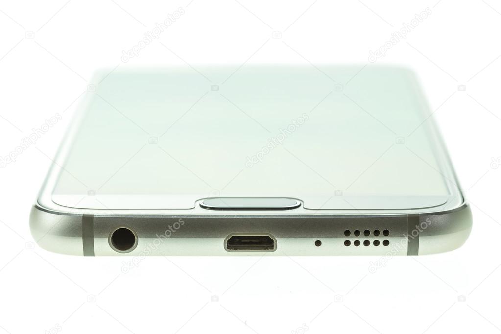 Macro bottom part of smartphone isolated on white