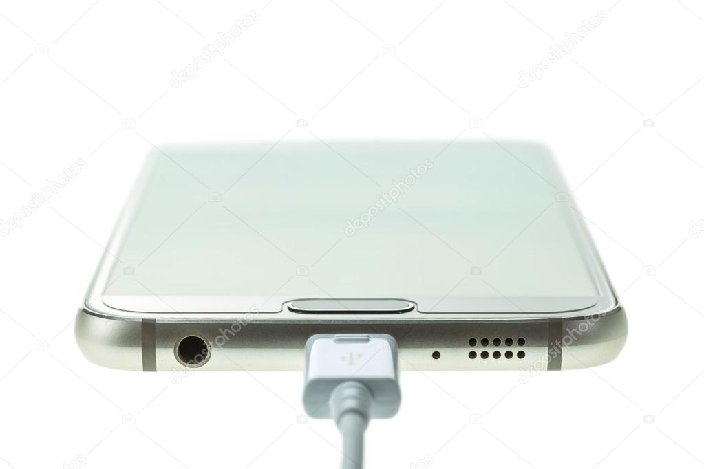 Macro Smartphone connect with charger isolated on white