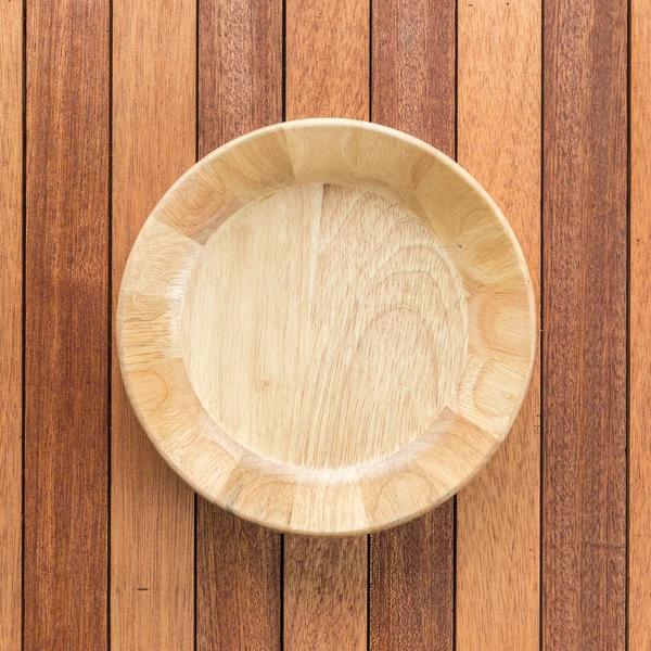 Порожня дерев'яна чаша на дерев'яному столі — стокове фото