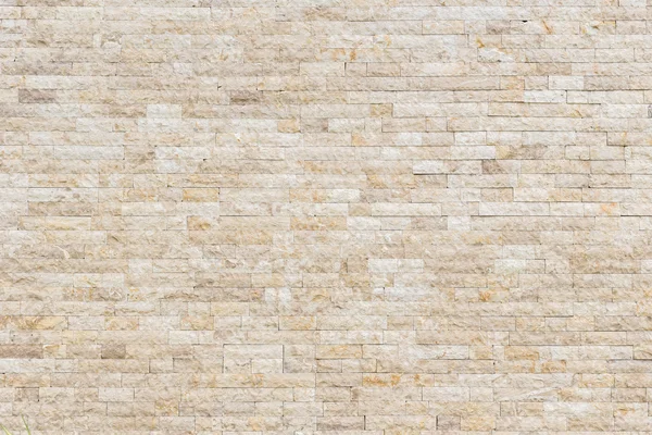 Travertijn natuurlijke stenen muur textuur en achtergrond — Stockfoto