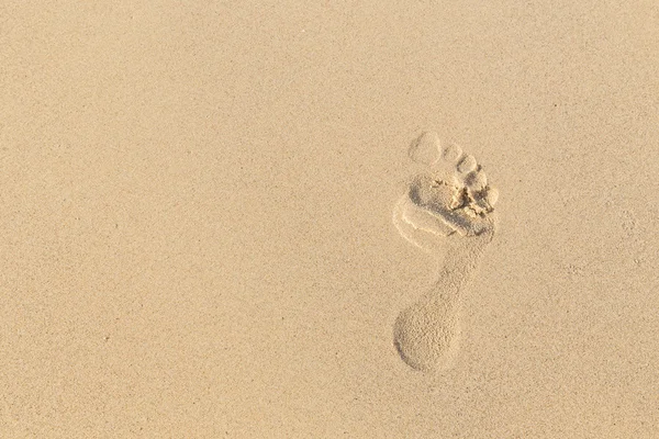 Foot prints on sand at the beach in the afternoon — Stock Photo, Image