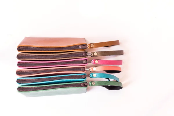 Detail barevné dámské kožené peněženky izolované na bílém — Stock fotografie