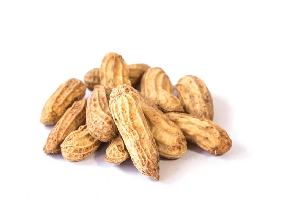 Close up ferveu amendoins em branco — Fotografia de Stock