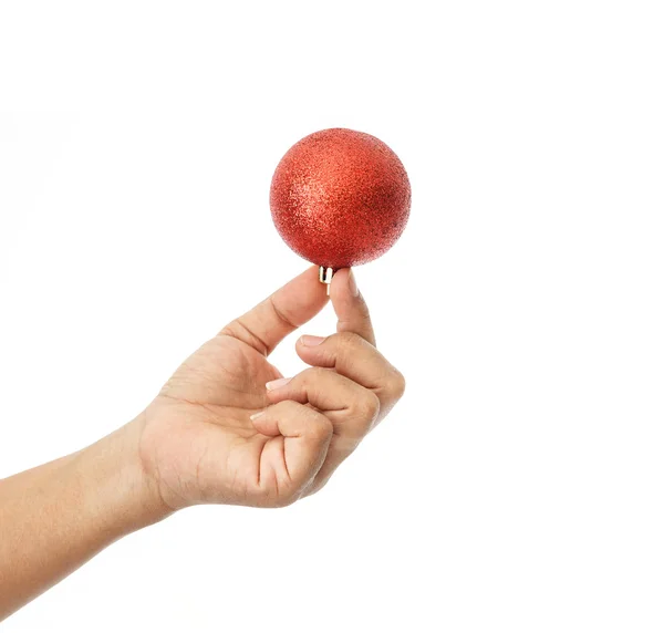 Hand holding Christmas ball isolated on white background — Stock Photo, Image