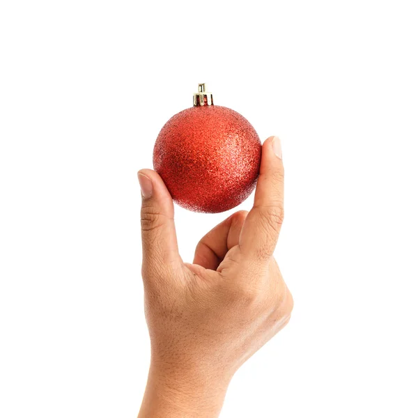 Mano celebración de la bola de Navidad aislado sobre fondo blanco — Foto de Stock