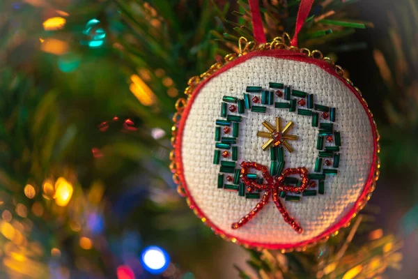 Handmade beaded wreath Christmas tree ornament, decoration. Christmas card.
