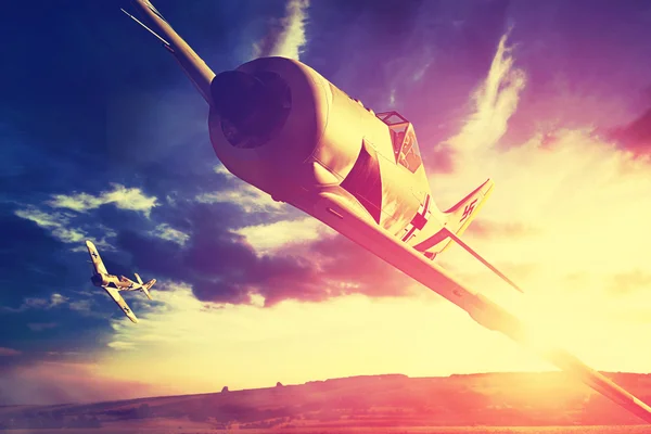 Uçuş sırasında günbatımı iki Focke-Wulfs 190