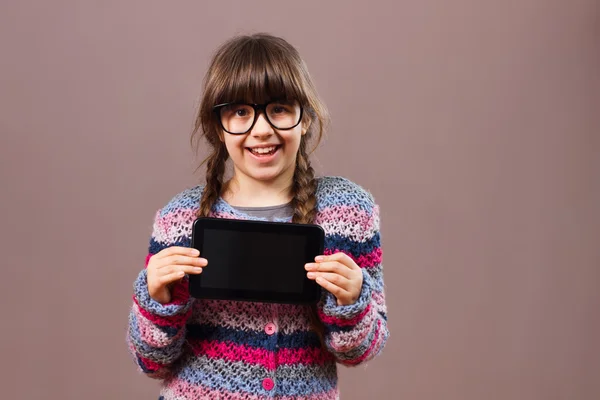 Little nerd girl with tablet — Stock Photo, Image