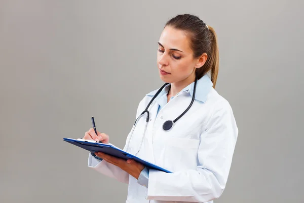 Thinking woman doctor — Stock Photo, Image