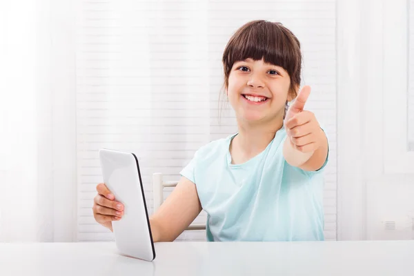 Little girl with digital tablet — Stock Photo, Image